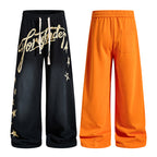 Yiaknis Wide-Leg Trousers, Script Letter, Black and Orange – photo 3