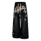 Yiaknis Wide-Leg Trousers, Script Letter, Black and Orange – photo 7
