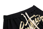 Yiaknis Wide-Leg Trousers, Script Letter, Black and Orange – photo 11