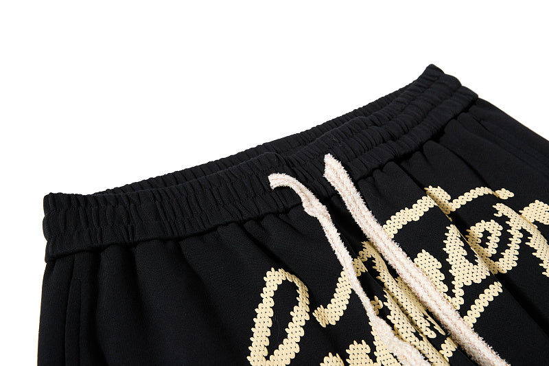 Yiaknis Wide-Leg Trousers, Script Letter, Black and Orange – photo 11