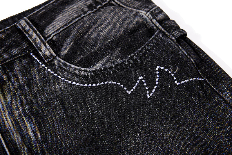 Yiaknis Black Flared Jeans with Gold Leg Embroidery