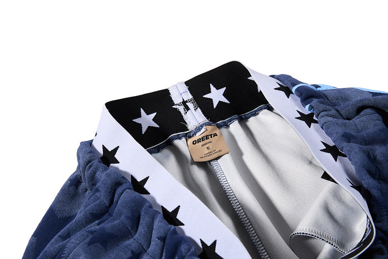 Yiaknis Wide-Leg Star Print Sweatpants, Script Print, Blue and Black