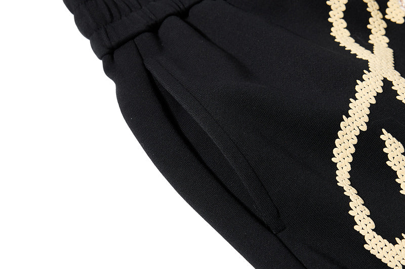 Yiaknis Wide-Leg Trousers, Script Letter, Black and Orange – photo 16