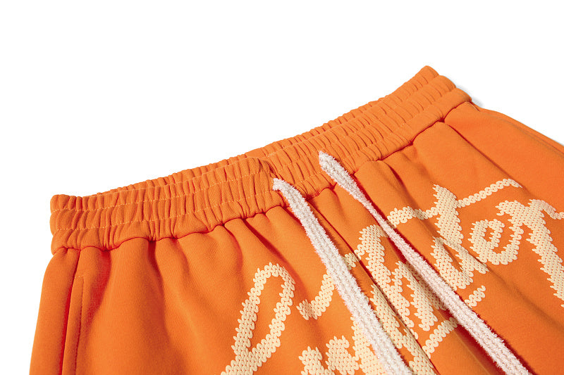 Yiaknis Wide-Leg Trousers, Script Letter, Black and Orange – photo 30